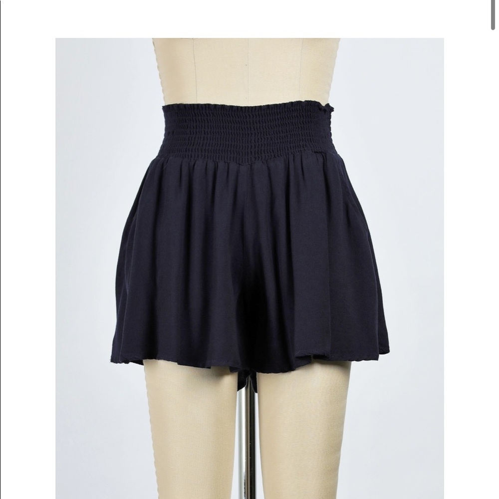 Navy smocked shorts